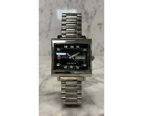 Rado - a Manhattan automatic wristwatch, stainless steel case, rectangular Tv case, black dial, raised block baton markers, d