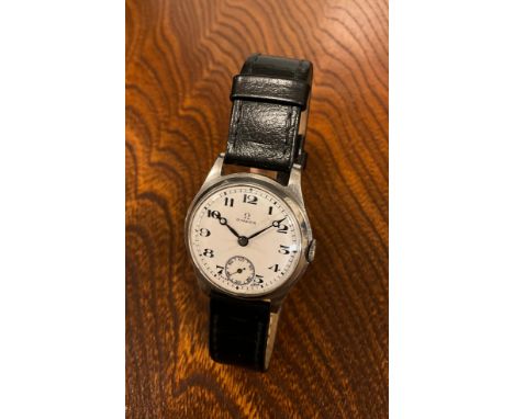 Omega - a 1930s Denisteel cased wristwatch, white enamel dial, bold black Arabic numerals, minute track, subsidiary seconds, 