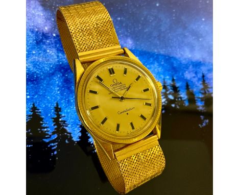 Omega - an 18ct gold Constellation chronometer wristwatch, gold coloured dial, baton hour markers, centre seconds, 32mm diame