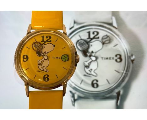 A Timex limited edition 'Snoopy Tennis' wristwatch, yellow dial and strap, stainless steel 34mm diameter case, tennis ball se