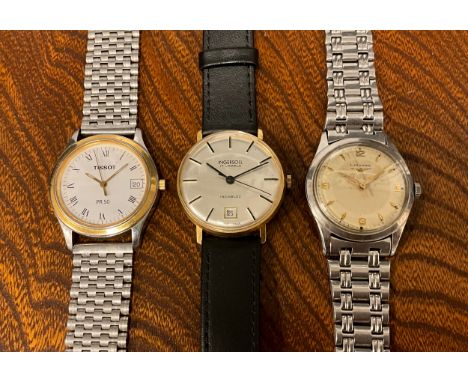 Watches - a 1950s Longines gentleman's stainless steel manual wind wristwatch, circa 1953, two tone dial, raised Arabic numer