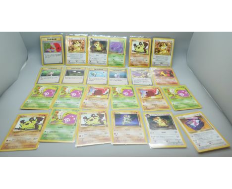 Thirty-six vintage Pokémon cards in protective sleeves, mostly Team Rocket