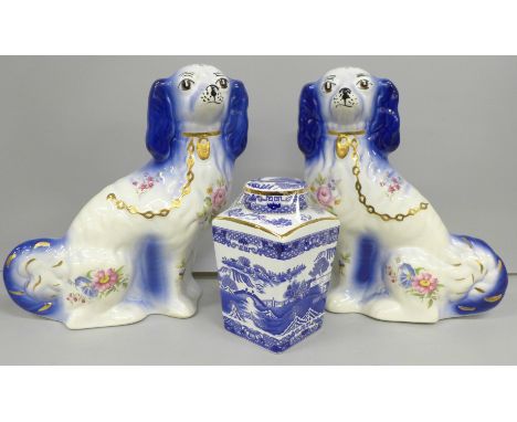 A pair of Staffordshire style dogs and a Ringtons Willow Pattern tea caddy 