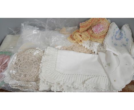 A collection of textiles/linen including crochet mats, embroidered tablecloths and lace, etc. **PLEASE NOTE THIS LOT IS NOT E