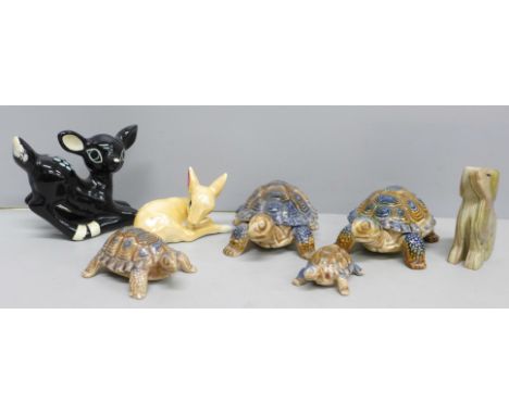 Four Wade tortoises and three animals 