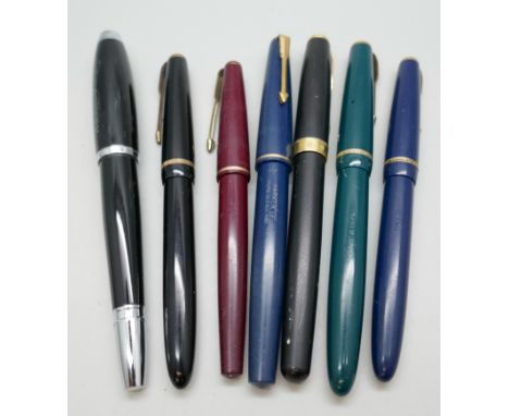 Six Parker fountain pens including two with 14ct gold nibs and a Cross fountain pen 