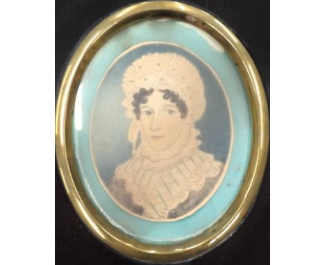 19thC Portrait miniature. Head and shoulders of a lady, watercolour, 6cm x 4.5cm, ebonised wooden frame.