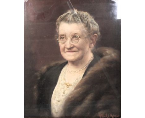Frank C. King (1877-1955). Portrait of a lady, oil on canvas, signed, 59cm x 49cm. Artist label verso.