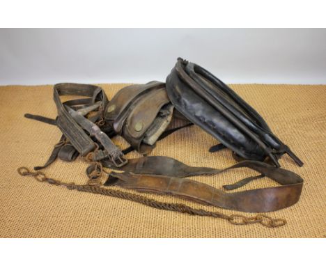 A vintage tan and black leather cart horse harness, the yolk by Lewis of Whitchurch, (Qty)