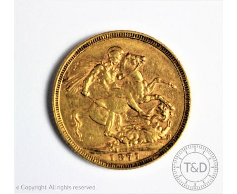 A Victorian gold sovereign dated 1871, London Mint, young head with large 'BP'?