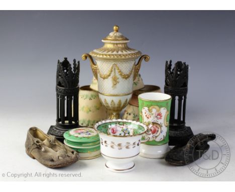 Two 19th century bronze sleeves, of gothic design, two vintage childs shoes, a vase and cover etc (Qty)
