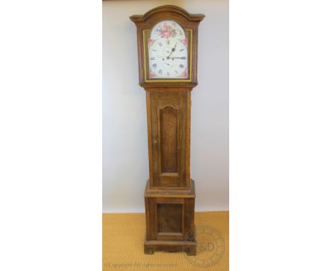 A George III style oak faux longcase clock, (no movement), printed face, 206cm