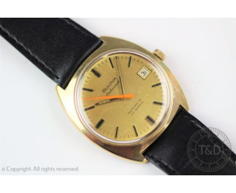 A Gentlemans 9ct gold Bulova Ambassador automatic wristwatch, the gold case enclosing a circular gilt dial with batons and or