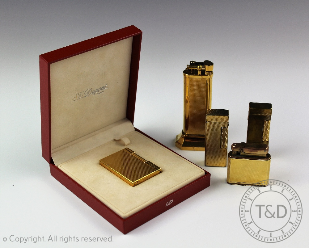 A collection of lighters, comprising; an S J Dupont, Paris lighter ...