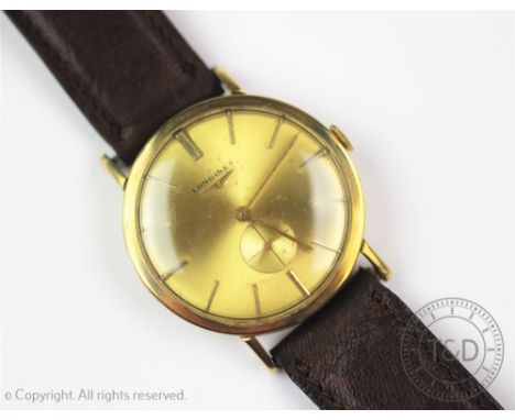 A Gentlemans Longines wristwatch, the circular gilt dial with batons and subsidiary seconds dial, manual wind, unmarked, dial