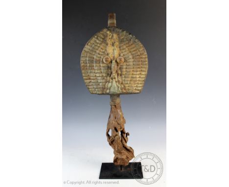 A large African tribal art mounted Mahongwe Bakota Gabon reliquary figure, wood and metal, on later metal stand, 69cm CONDITI