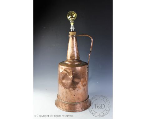 A large copper planished handled vessel, stamped, 58cm high, later converted to a lamp    CONDITION REPORT:  Lighting lots ar