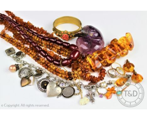 A collection of jewellery, to include; a 'cherry' coloured graduated bead necklace, assorted amber coloured bead jewellery, a