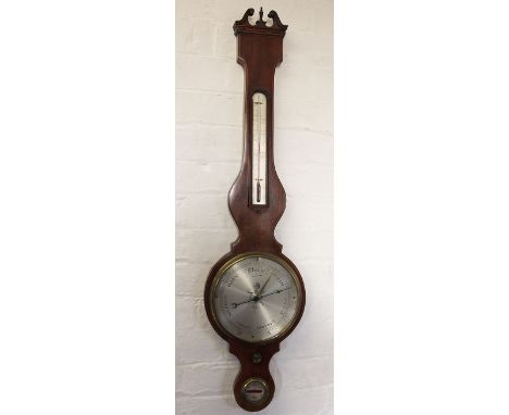 A George III inlaid mahogany wheel barometer, with silvered dial, thermometer and spirit level, 98cm H (Mercury mechanism) 