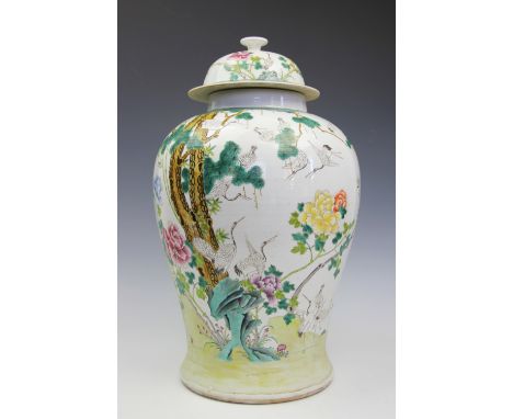 A large 20th century Chinese famille verte ginger jar and cover, Jiaqing seal mark, of baluster form, decorated to the exteri