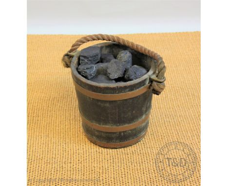 A late 19th century copper coopered bucket, with bronze lugs and rope handle, 30cm H 