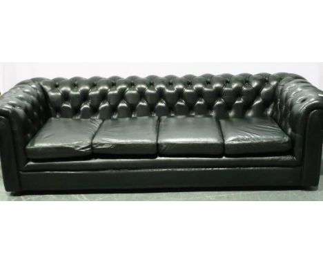 A contemporary black leather Chesterfield style sofa, four seat, L: 240 cm, good order throughout, no visible damages besides