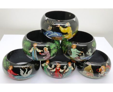 Six wooden Russian hand painted napkin rings. P&amp;P Group 1 (£14+VAT for the first lot and £1+VAT for subsequent lots) 