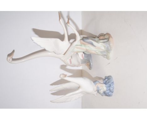 Three Nao swans, largest 30cm 
