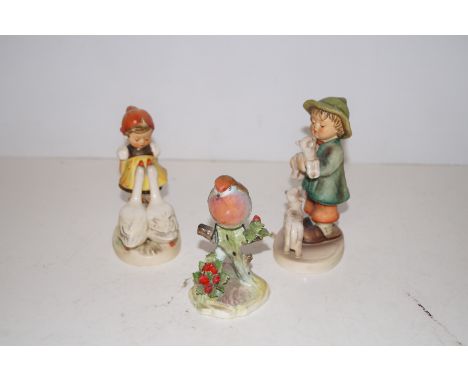Two Hummel figures, one a/f, also on e further figure 