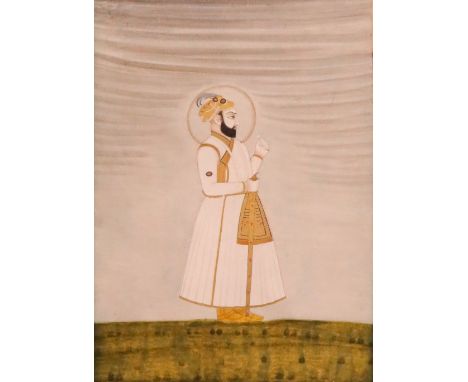 λ Indian School 18/19th CenturyThe Emperor Farrukh-Siyar standing in a field holding a small white flower, dressed in white a