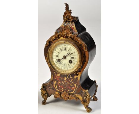 A late 19th Century French boulle work mantel clock, the enamelled roman dial with outer arabic numerals, two train French dr