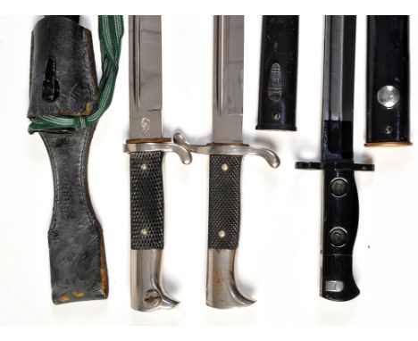 A German Second World War K98 dress bayonet, with black painted metal scabbard, black leather frog with Infantry officer's kn