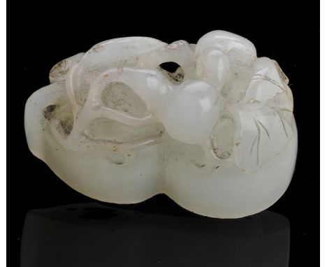 Chinese double gourd celadon jade seal, carved with fruiting gourds upon a double gourd-shaped base, the stone of a pale cela