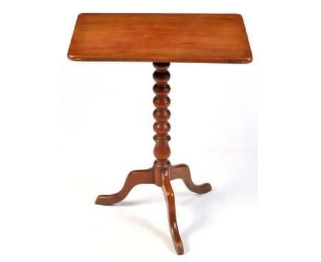 A 19th Century mahogany rectangular-shaped tip-up-top occasional table, raised on a bobbin turned column with tripod legs, 21