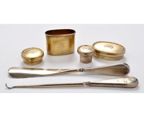 Four George V silver gilt mounts for dressing table jars, by Finnigins Ltd., London 1914, engine turned and engraved initials