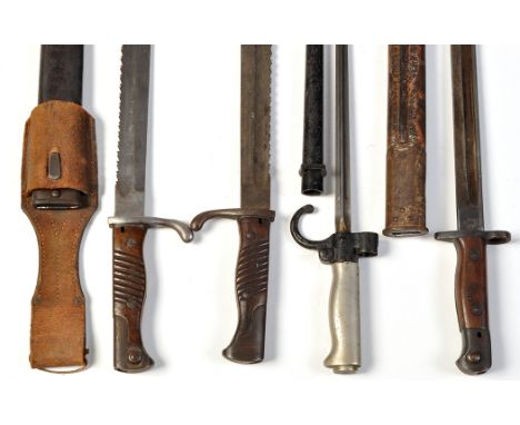 First World War bayonets, to include: two German Muser bayonets model 98/05, one by A-G, Duisburg, with metal scabbard and le