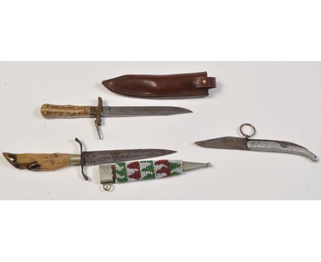 A 19th Century German hunting dagger, the double-edged blade on hilt with steel cross guard and hoof grip, the metal mounted 