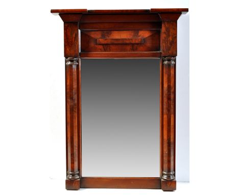 A William IV mahogany wall mirror, the flared cornice above panel frieze, rectangular plate under flanked by pilasters, 25 1/