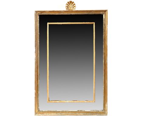 *An early 19th Century wall mirror, the central plate within beadwork slip surrounded by mirrored bezel, the frame decorated 