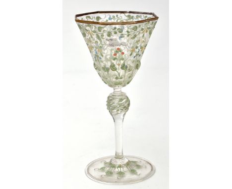 Enamel and overlay wine glass, octagonal bowl above spiral knop and folded foot, painted with animals leaping amidst foliate 
