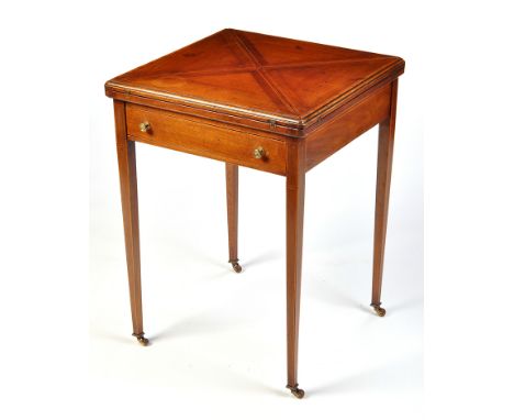 An Edwardian inlaid mahogany envelope swivel top card table, decorated with boxwood and ebony stringing, fitted frieze drawer