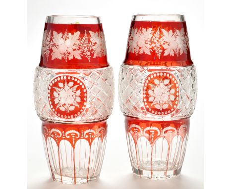 Pair of Bohemian ruby 'overlay' glass barrel-shaped vases, central cut bands with floral roundels, height 22cms.  (2)