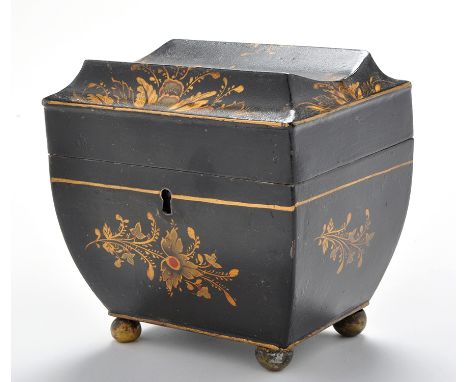 A 19th Century Toleware tea canister, the inverted caddy top and base decorated with leaf designs, raised on bun feet, 4 3/4 