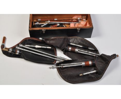 A selection of Northumbrian small pipe parts, including: leather bags; pipes; chanters (no bellows), in a box.