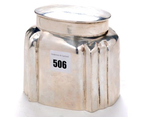 A late Victorian tea caddy, by Huttons, London 1899, shaped oval with detachable cover 12cms (4 3/4in.), 8.1oz.