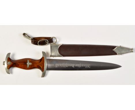 A German Second World War SA service dagger, by Hacao, Berlin, the double-edged blade etched 'Alles Fur Deutchland', the meta