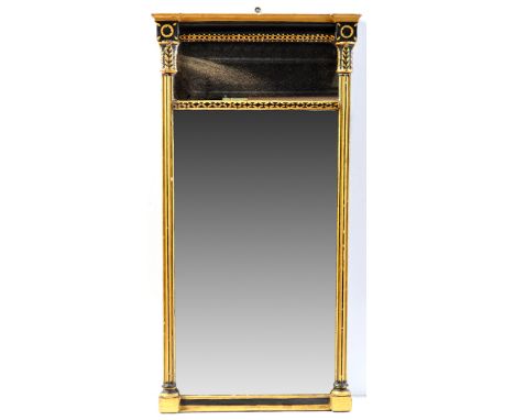 *A Regency wall mirror, the two rectangular plates within a gold and black painted frame, decorated with leaf capitals and fl