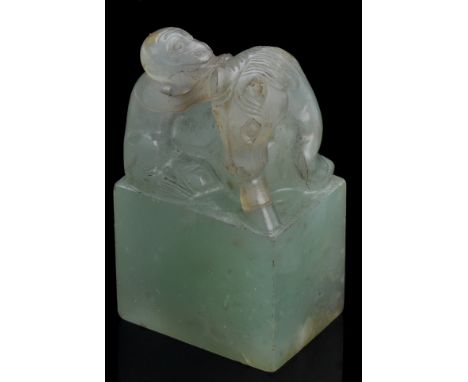 Chinese green jade seal, of rectangular form with finial carved as a recumbent horse and monkey group, the stone of mid green