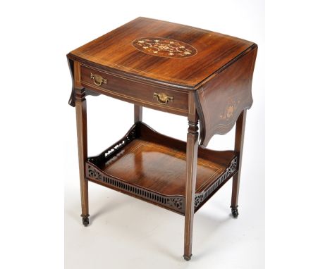 An early 20th Century rosewood drop-leaf occasional table, inlaid with ivory and boxwood foliate scrolls, shells and stringin