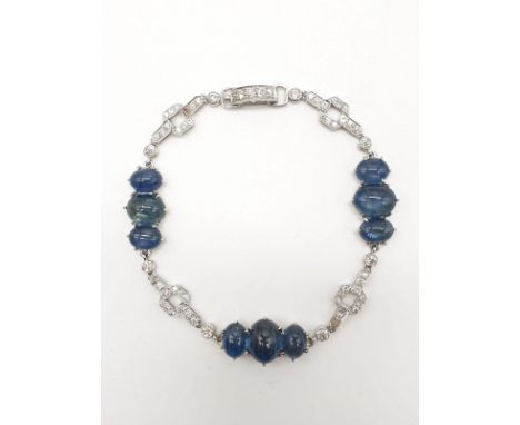 Sapphire and diamond bracelet set in 18ct white gold, weight 15.53g and 19.5cm long approx.Bigger sapphires size 10x12mm and 